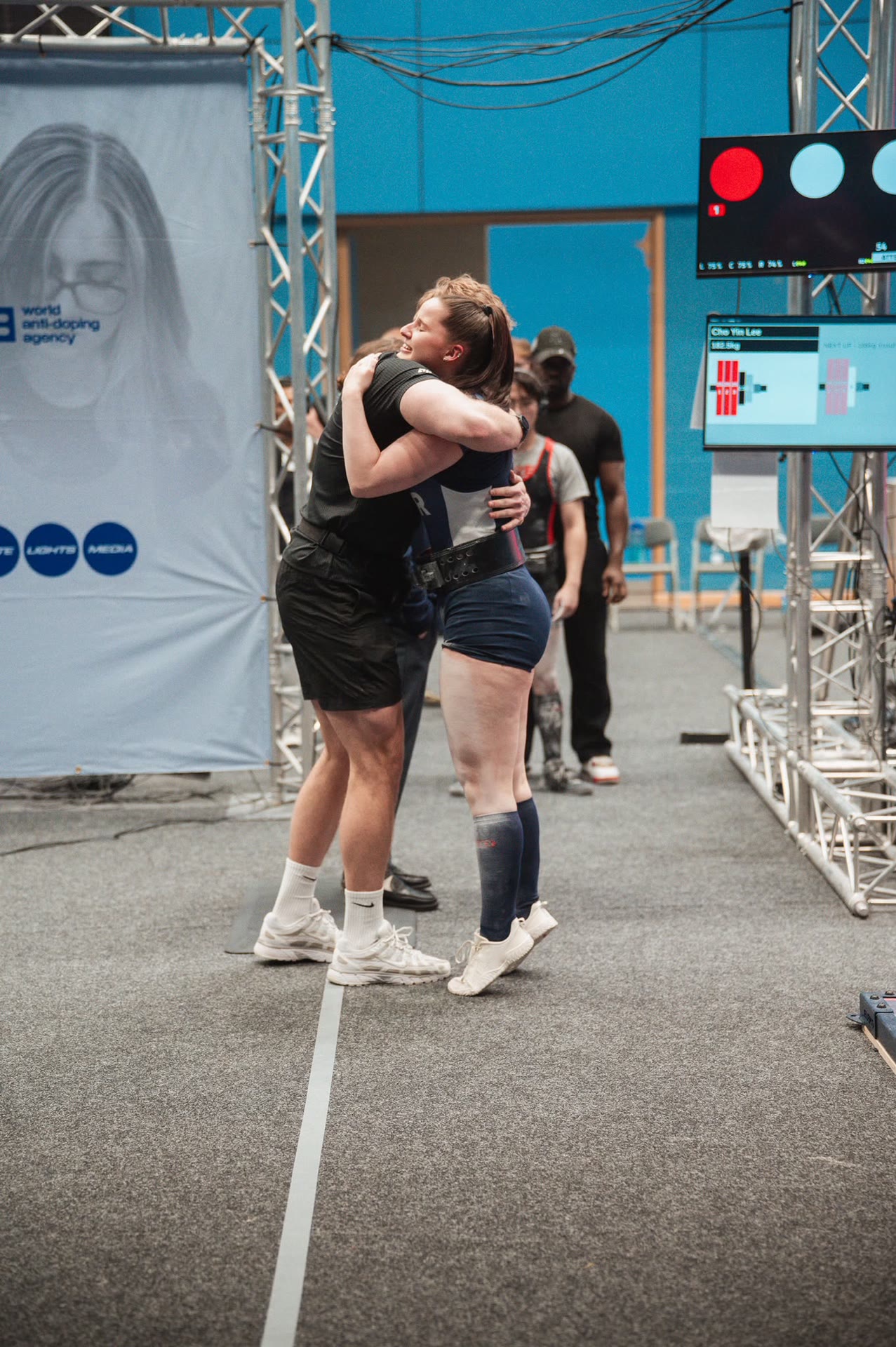 Apto Performance lifters celebrating after a competition